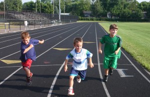 bigstockphoto_Kids_Running_on_Track_781902[1]